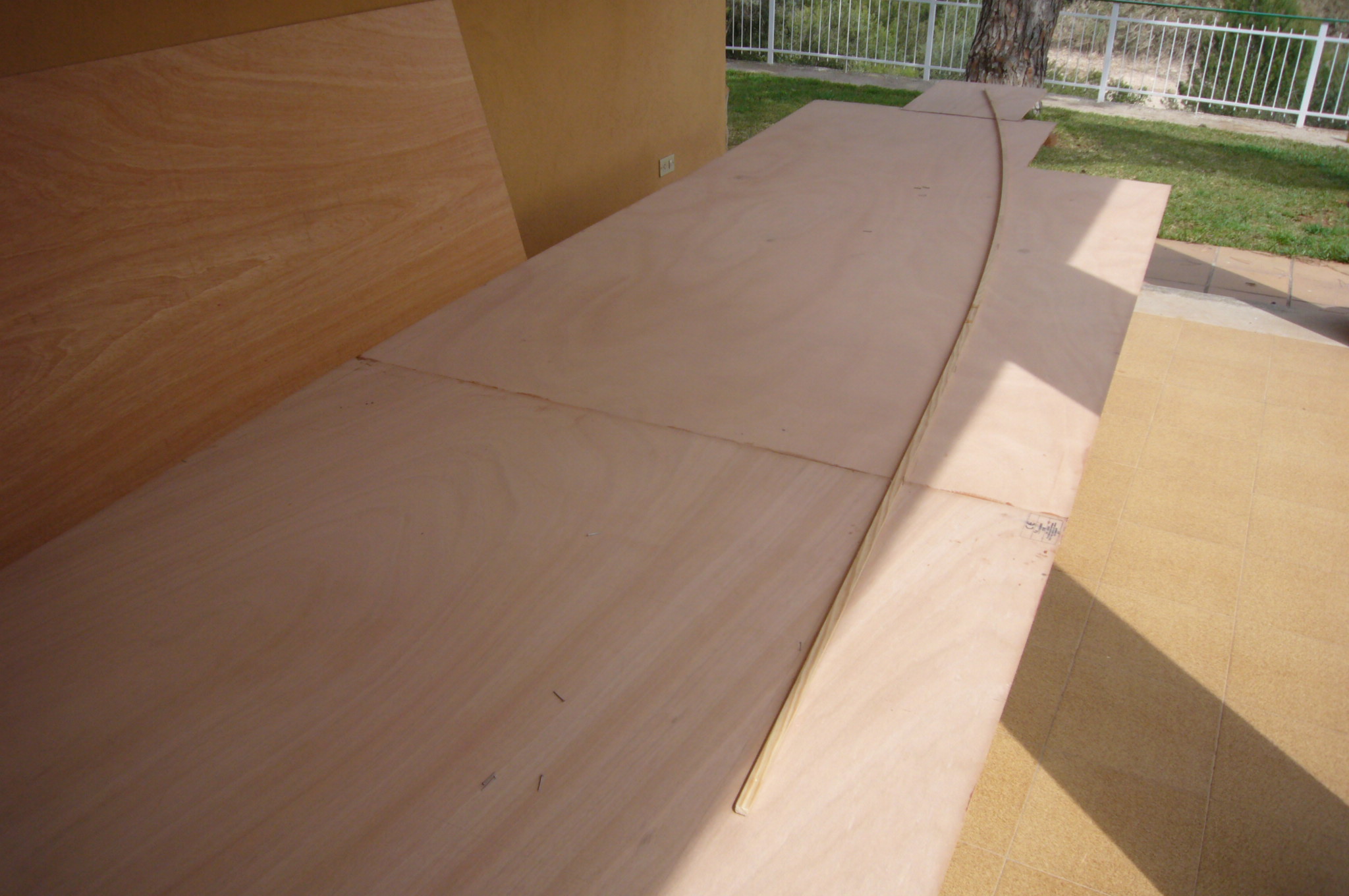 Marine grade playwood. Sheets are joined using a taper joint